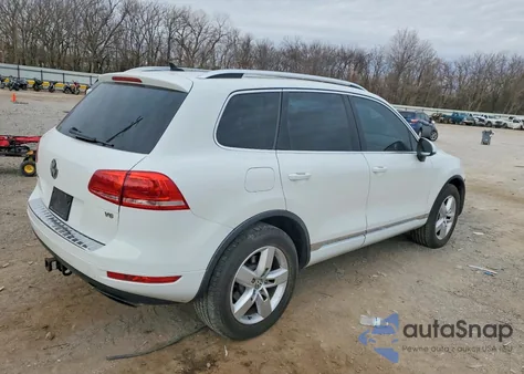 2014 Volkswagen Touareg V6 z USA, uszkodzony, nr VIN WVGEF9BPXED013191